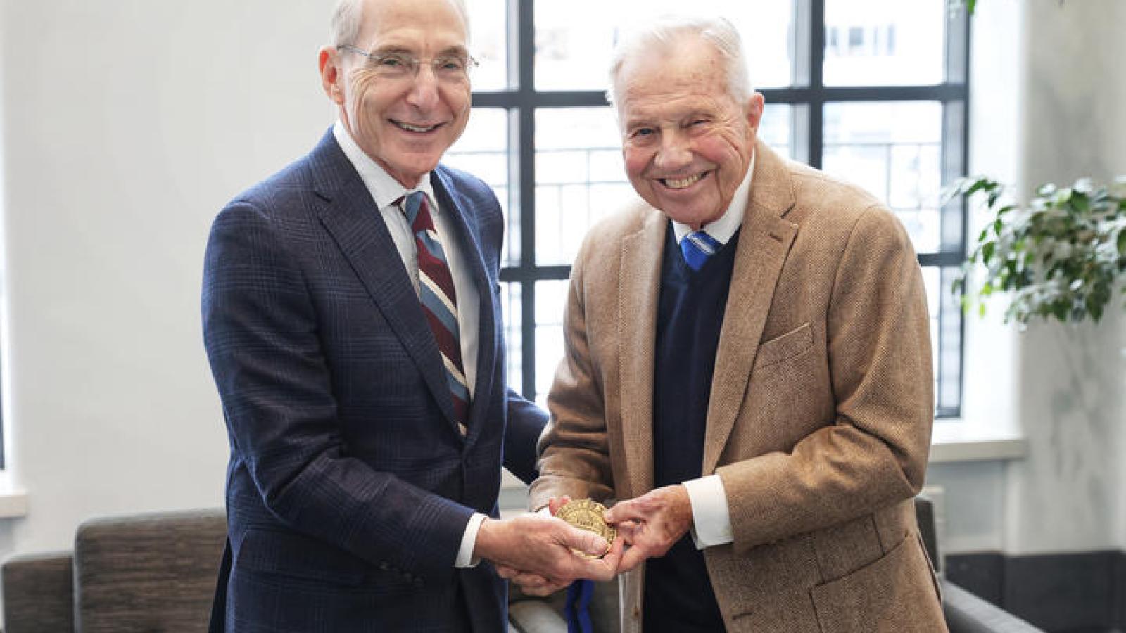 UK President Eli Capilouto (left) presented James F. Hardymon with the 2025 Founders Day Award on Feb. 21, 2025. 