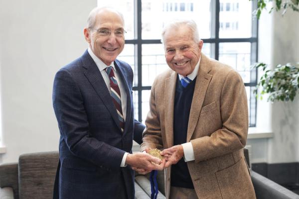 UK President Eli Capilouto (left) presented James F. Hardymon with the 2025 Founders Day Award on Feb. 21, 2025. 