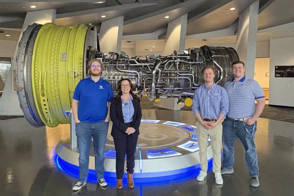 Grady and students at GE Aerospace facility 