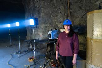 Woman infront of LED Lights underground